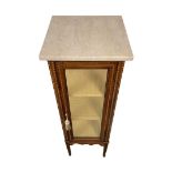 An Edwardian inlaid mahogany pedestal vitrine, square marble top, fitted with two shelves, square ta