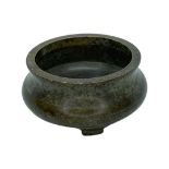 A Chinese Bronze Censer with tripod feet, with impressed seal mark to base