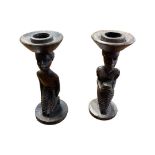 Pair of African wooden carved tribal style candlesticks.