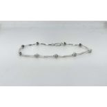 9ct White Gold And Diamond Bracelet, length 7 inches ( 4.4 grams )
