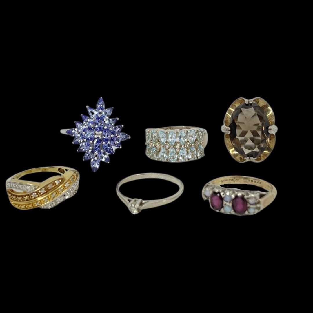 Mixed Lot Of Silver Rings To Include a Solitaire Diamond Ring