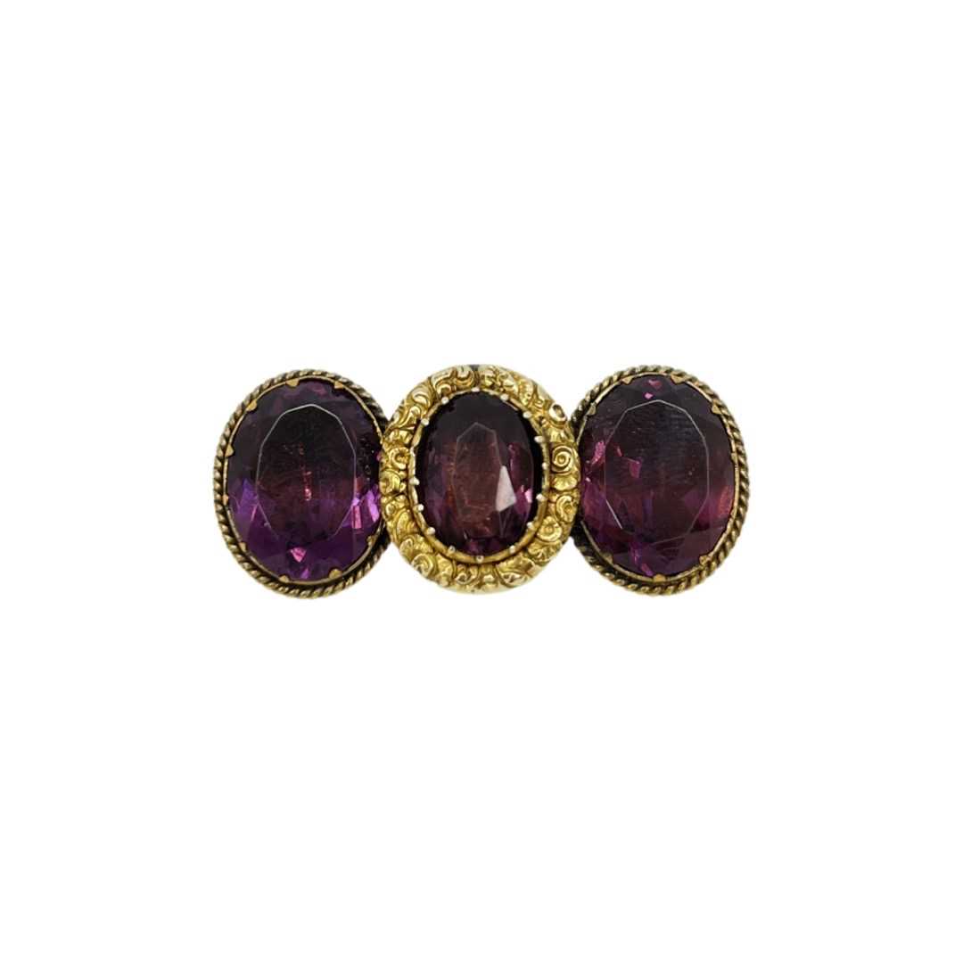 Vintage Yellow Metal and Amethyst Brooch