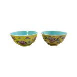 A pair of Chinese porcelain yellow ground bowls