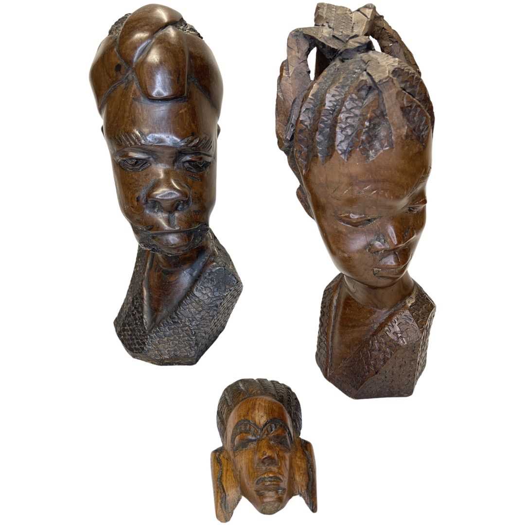 A mixed lot comprosing 2 mid 20th century African carved hardwood busts