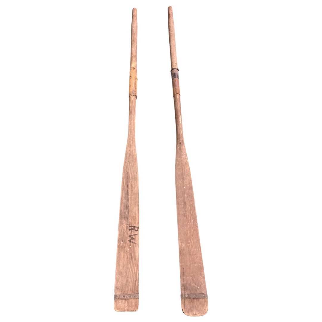 A pair of vintage rowing oars