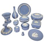 A collection of blue Wedgwood Jasperware including 5 pot and covers,