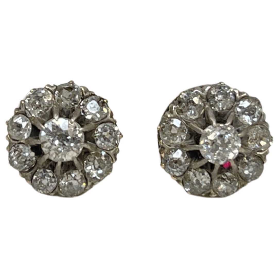 A Pair of Antique Diamond Cluster Earrings Mounted in Silver and Gold