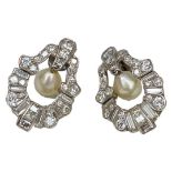 A Pair of Fine Art-Deco Natural Pearl and Diamond Pendant Earrings, mounted in Platinum