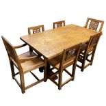 A superb Robert 'Mouseman' Thompson of Kilburn refectory dining table and six lattice back chairs