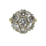 A Large Brilliant Cut Diamond Cluster Ring.