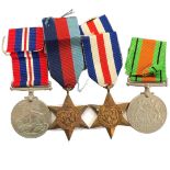 A Second World War medal group of four to Sergeant P T Dell of the Suffolk Regiment.