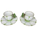 Two rare Aynsley Art Deco green butterfly handled cup and saucers