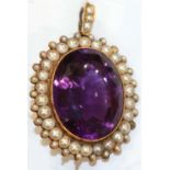 An antique Amethyst and split pearl pendant circa 1830
