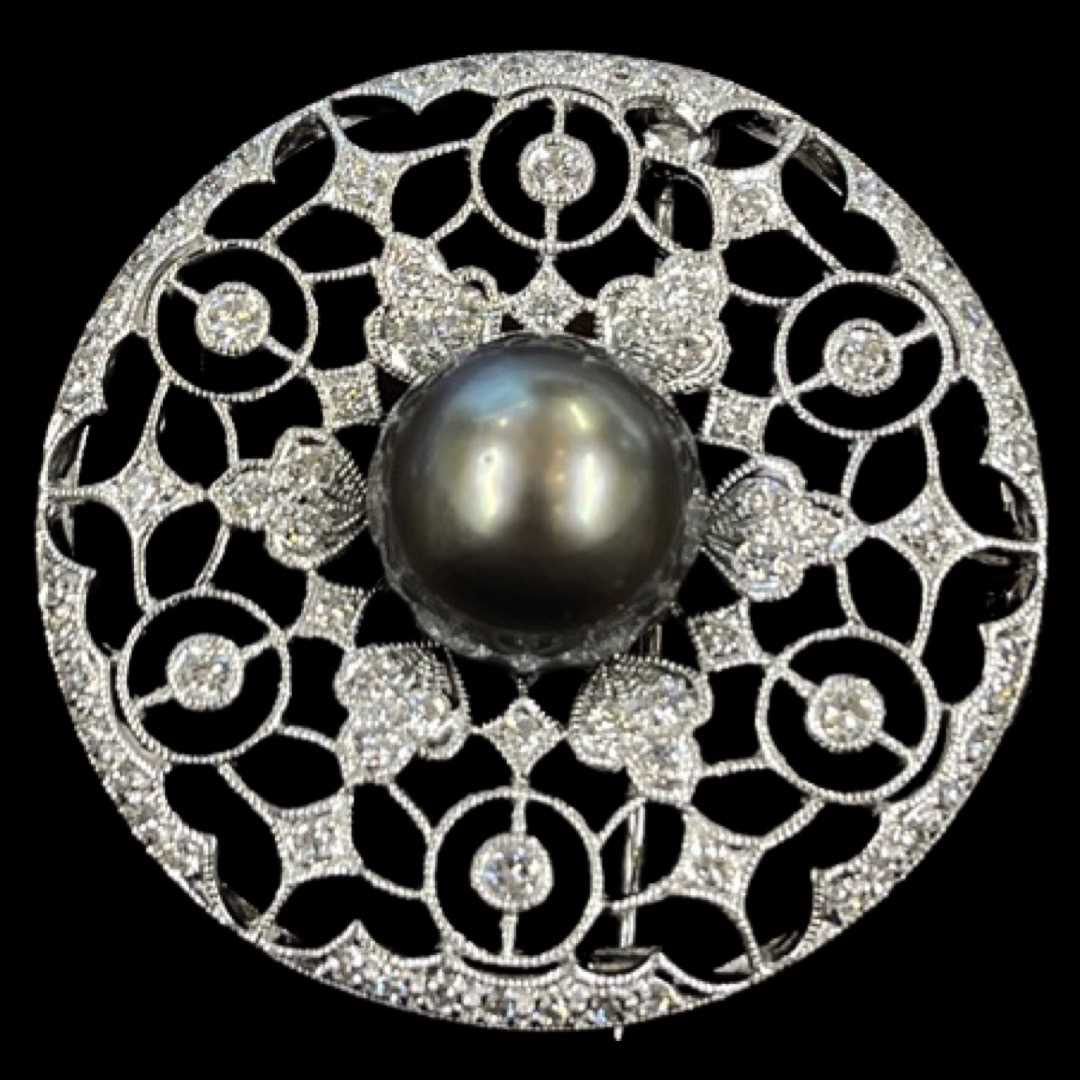 A Cultured Pearl and Diamond Pendant Brooch