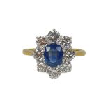 An 18ct Sapphire and Diamond Cluster Ring