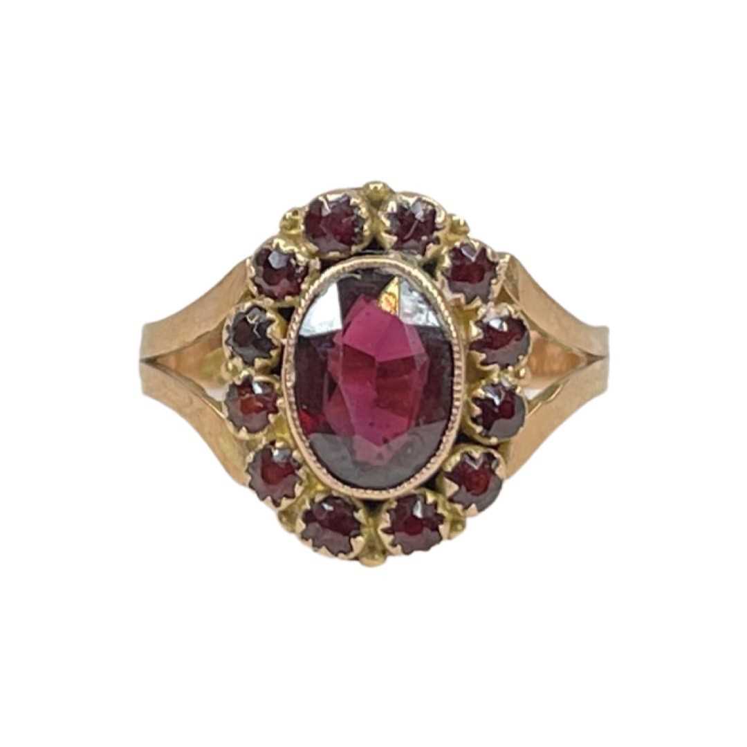 An Antique Gold Garnet and Paste Cluster Dress Ring, circa 1860.