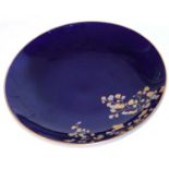An unusual Minton dark blue plate with gold and silver leaf floral decoration