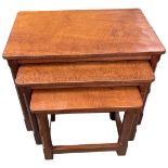 Robert 'Mouseman' Thompson of Kilburn, a nest of three oak coffee tables