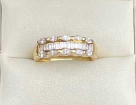 A diamond set 18 carat gold half hoop band ring