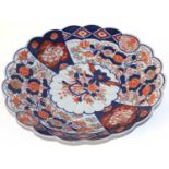 A 19th century Japanese Imari pattern porcelain scalloped dish