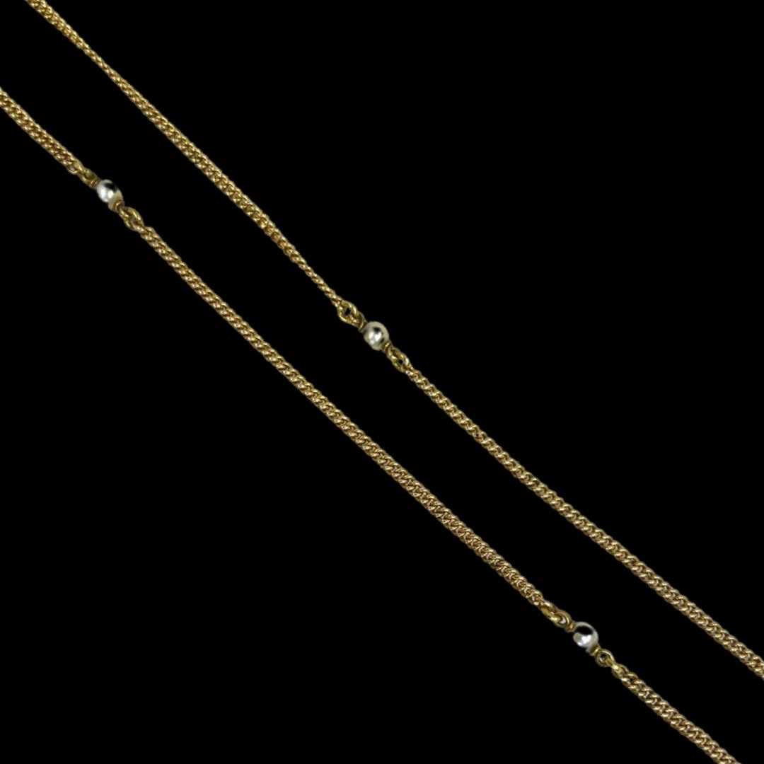 An Antique 18ct Yellow Gold Curbed Link and Seed Pearl Long Chain.