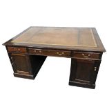 Late 19th/early 20th Mahogany partner's desk with gilt tooled leather top