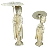 A Japanese Meiji period ivory okimono of a lady with parasol