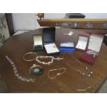 Selection of silver jewellery.