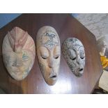 3 oriental masks.