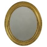 Kleiner ovaler Spiegel, deutsch Ende 19. Jh., profilierter vergoldeter Holzrahmen mit