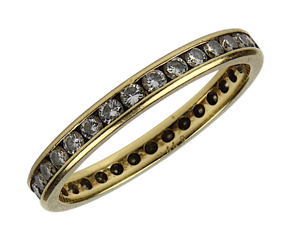 Gelbgold-Memory-Ring mit 32 Brillanten, Ringschiene gepunzt 750 und 0,77 ct (für Brillanten), 32