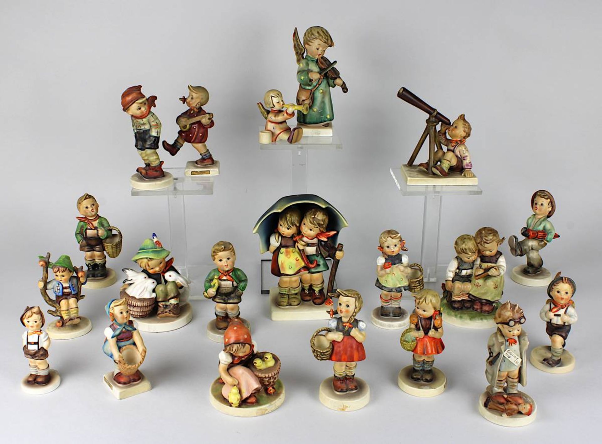 20 Hummel-Figuren, Goebel, 1960er bis 1990er Jahre, Keramikfiguren, farbig staffiert, u.a. "