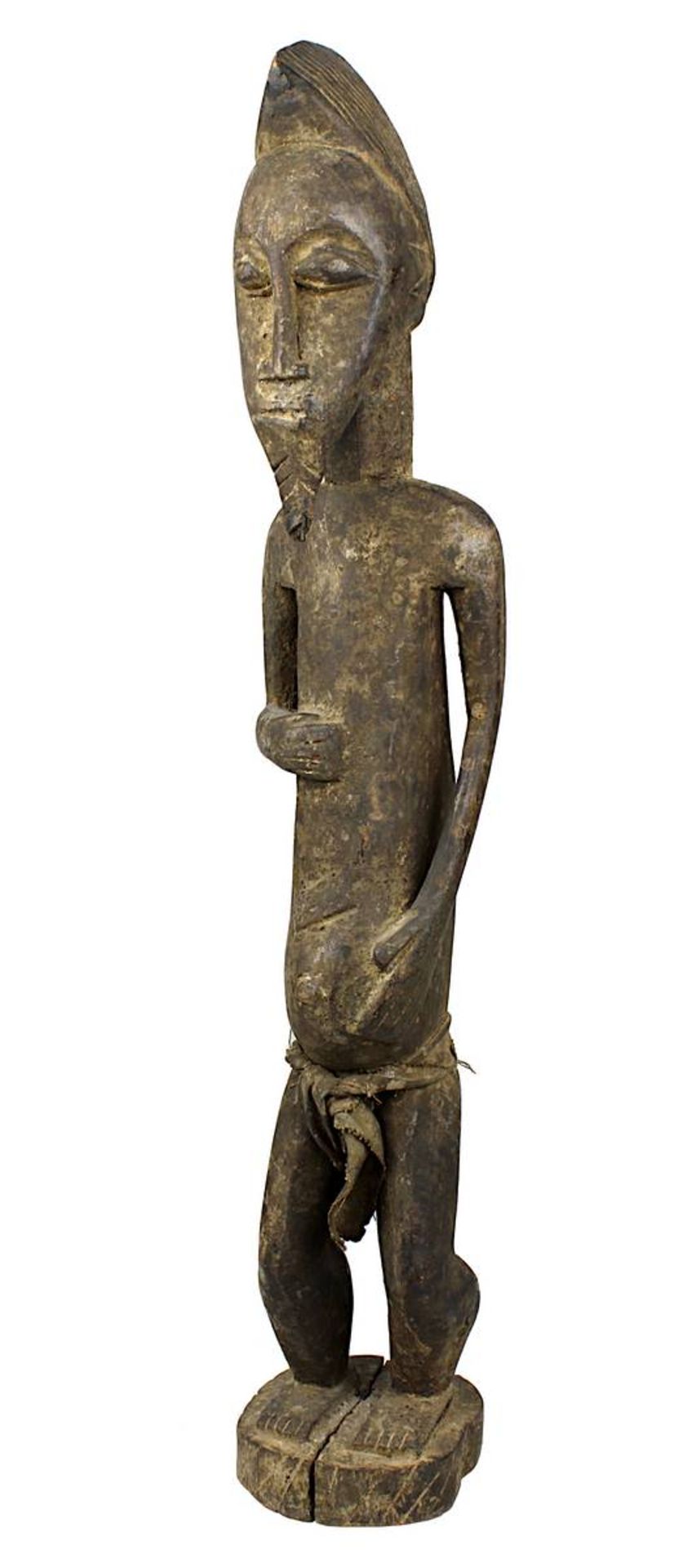 "Jenseits-Mann" blolo blan, Figur der Baule, Côte d'Ivoire, Holz geschnitzt und mit Resten von