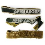 Drei Armbinden, Afrikakorps, Deutsches Reich 1933 - 1945, Ärmelband bestickt u. 2 Ärmelstreifen