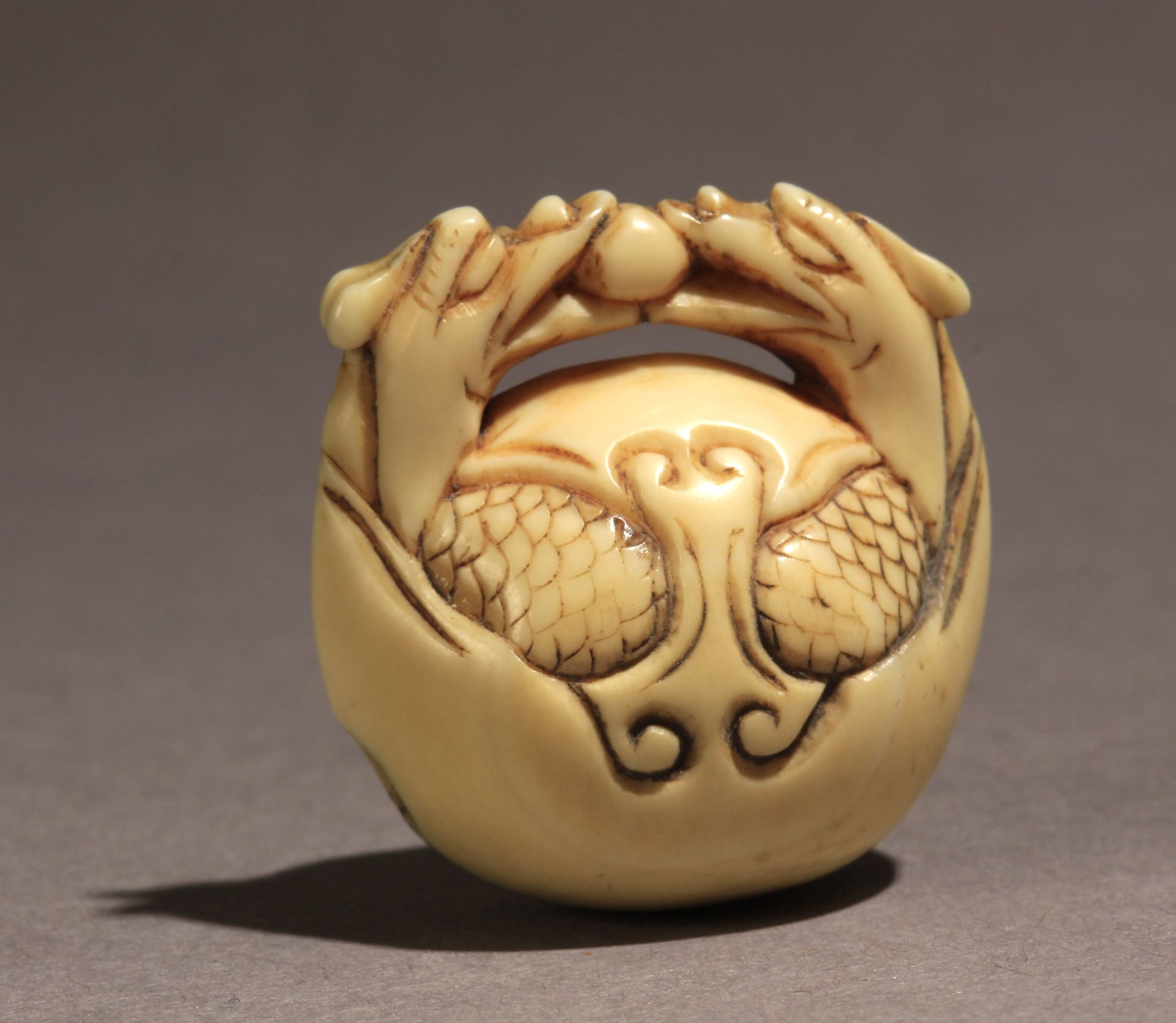 A 19th century Japanese netsuke-mokugyo from Meiji period