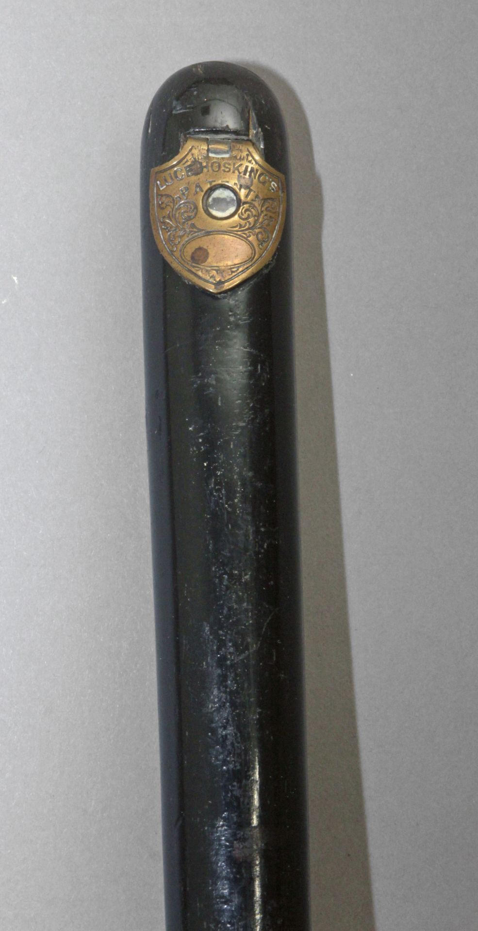 A 19th century probably English Luce Hoking's patent walking stick. Having an ebonized shaft