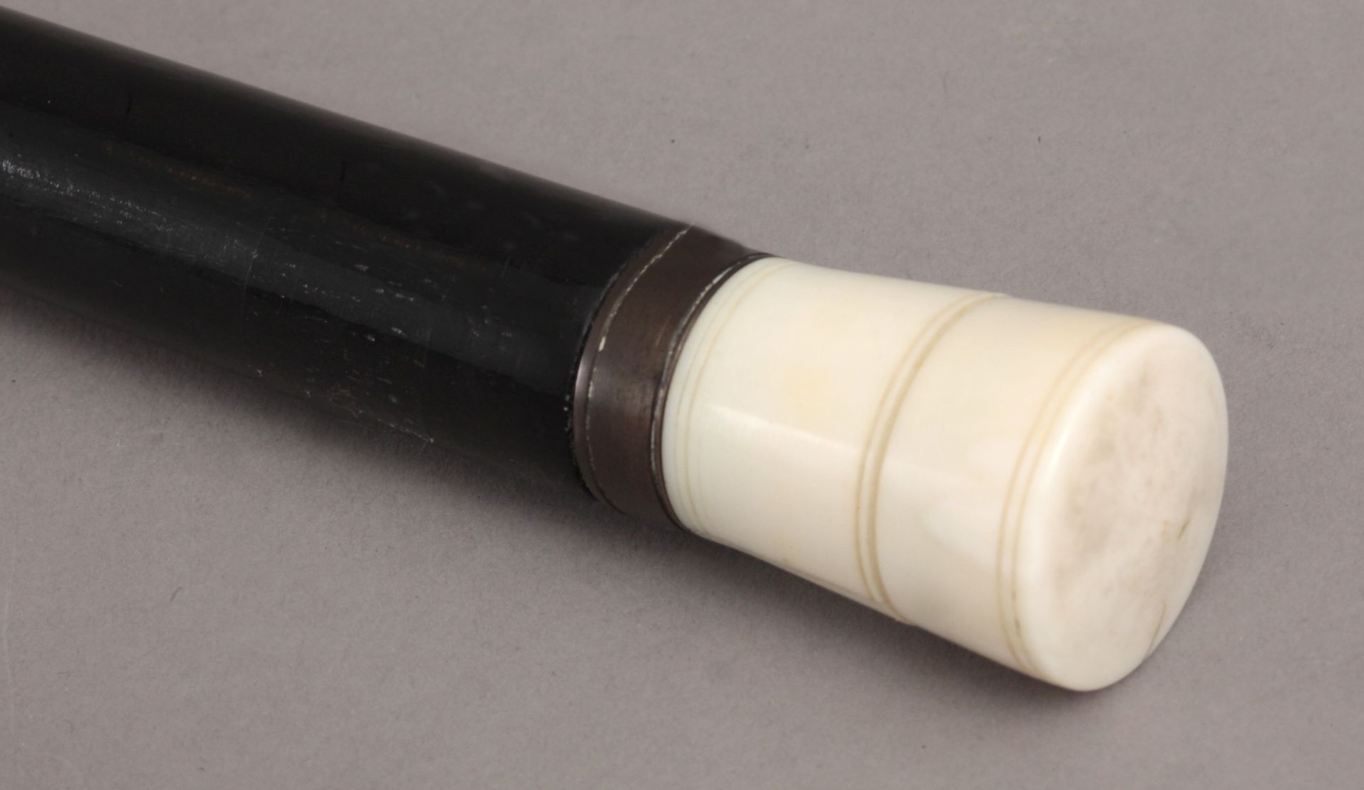 A 19th century ivory handled walking stick