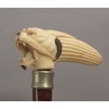A 19th century ivory handled walking stick