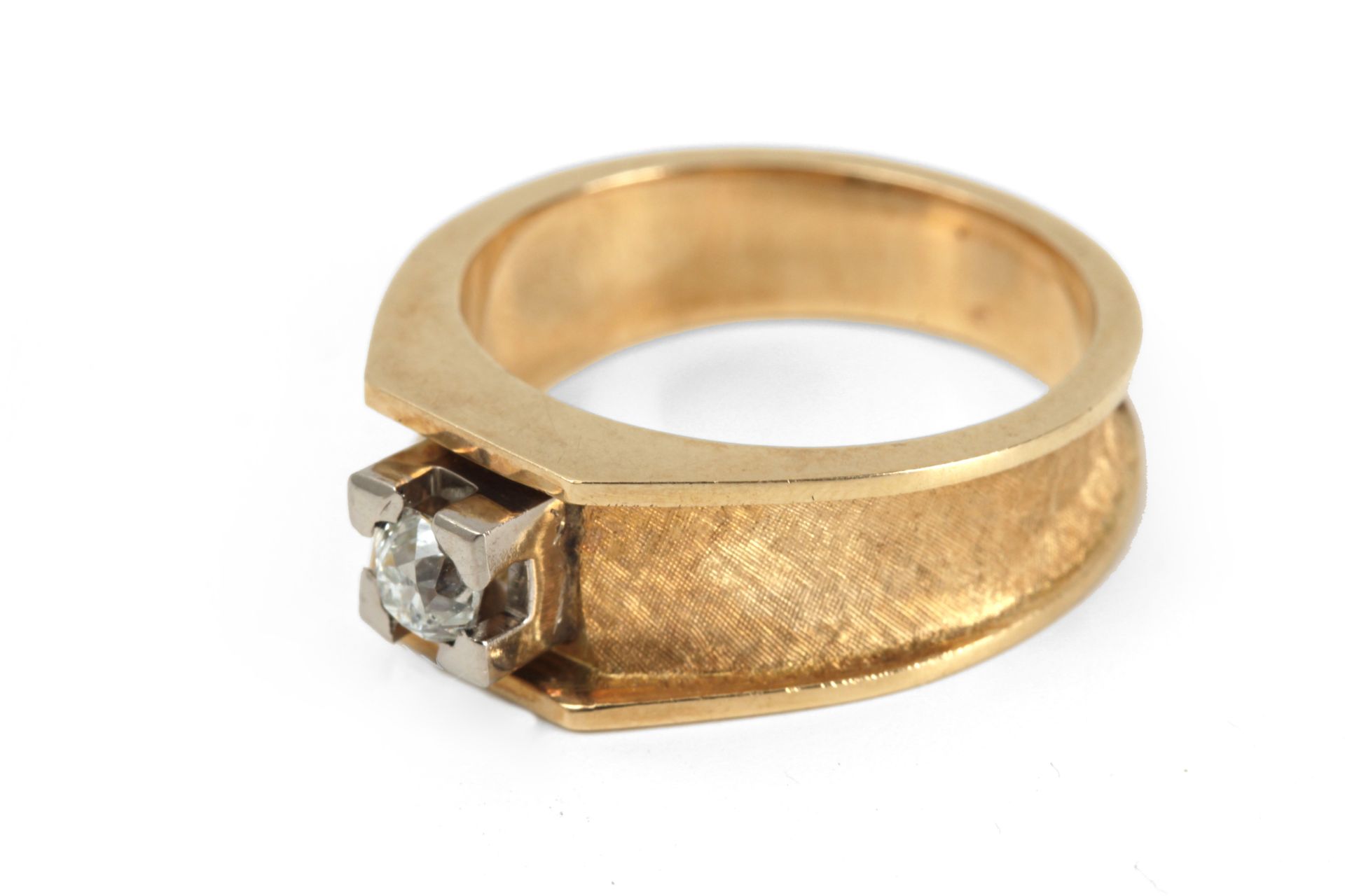 A 0,38 ct. old European cut diamond solitaire ring with an 18k. yellow gold and platinum setting