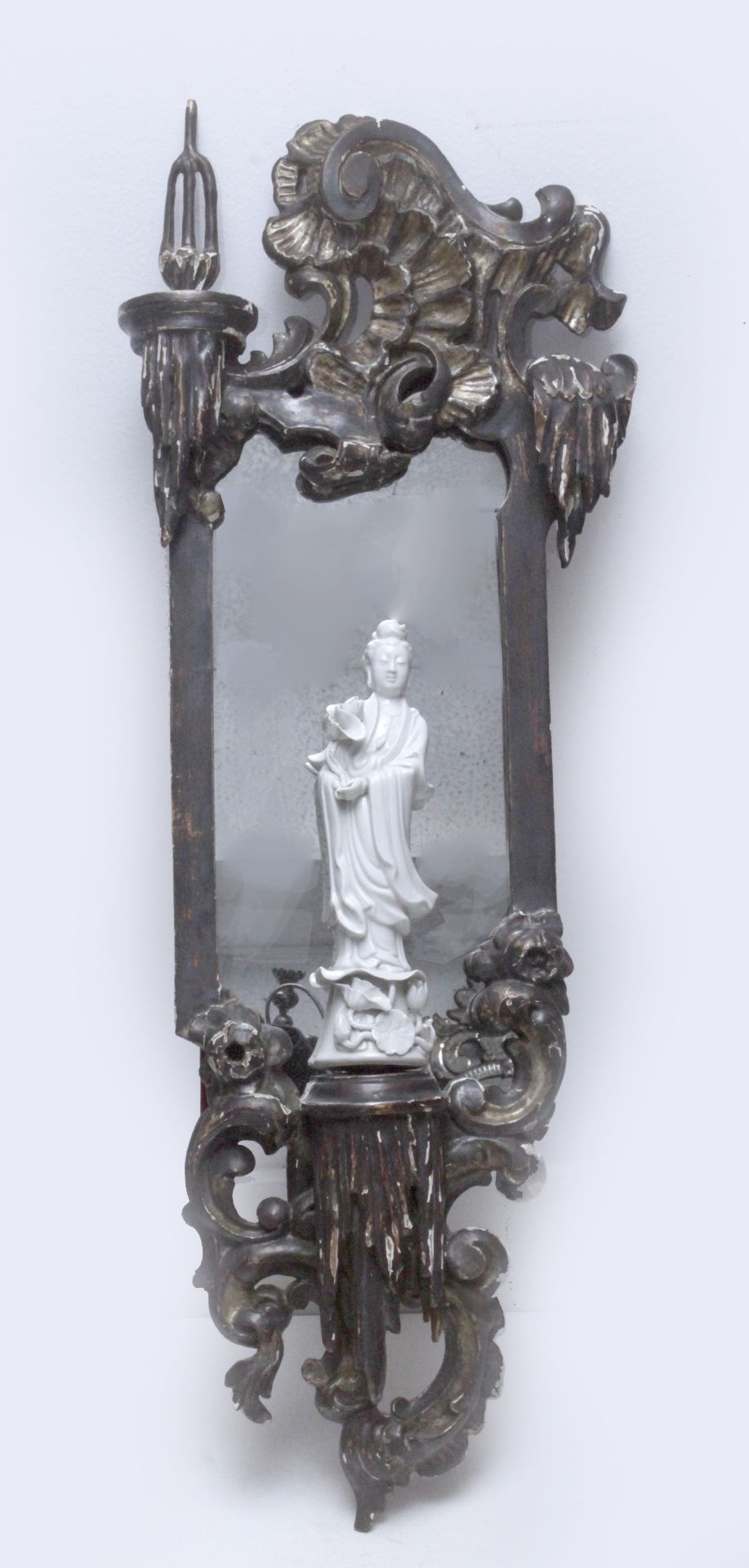 An early 20th century George III style mirror carved in the style of John Linnell