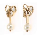 A first half of 20th century Empire style freshwater pearl earrings with a 18k. gold setting