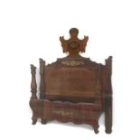 A 19th century Sapnish Fernandino period mahogany bed