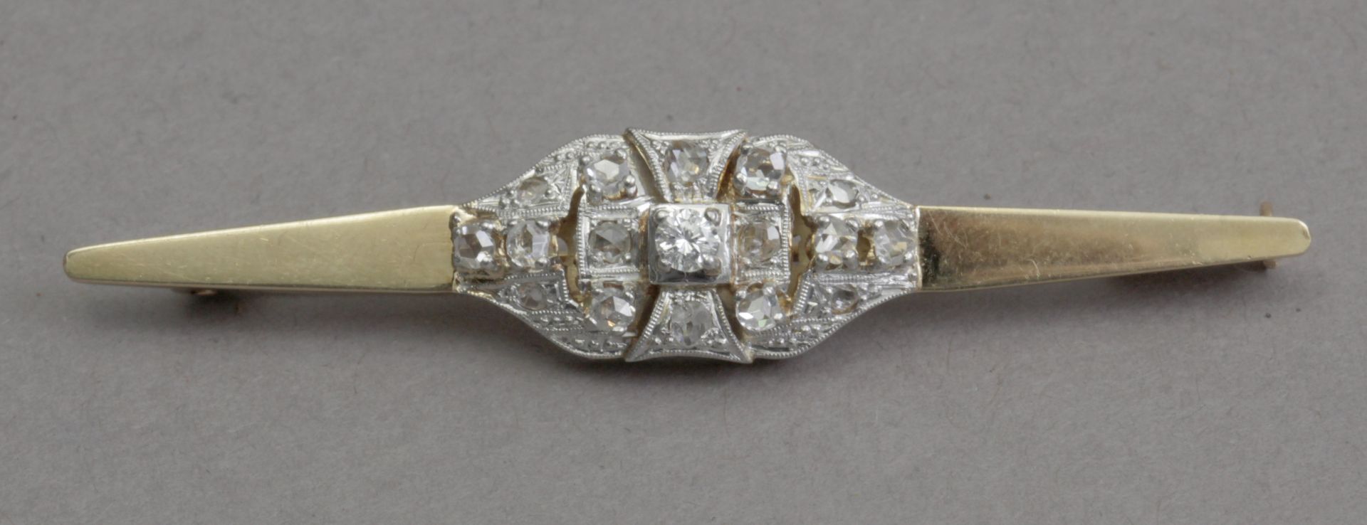 A 20th century Belle Époque style diamond tie pin with an 18k. gold setting