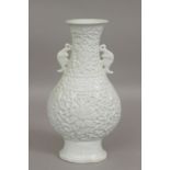 A 20th century Chinese vase in blanc de Chine porcelain