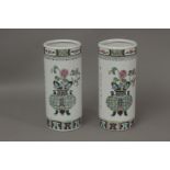 A pair of 20th century brush pots in Famille Rose porcelain