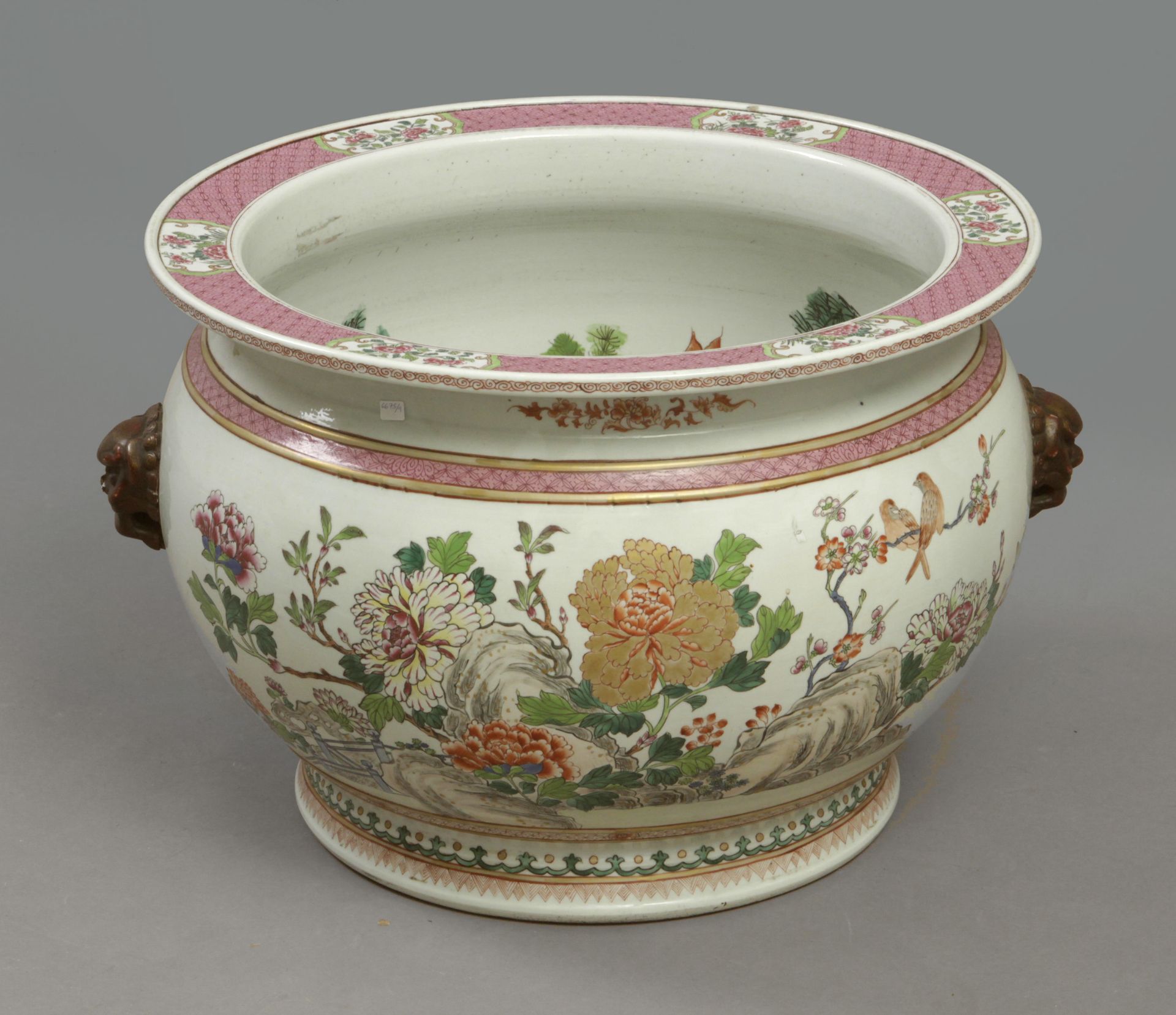 A 19th century Chinese cachepot in Famille Rose porcelain