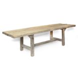 A rustic style pine dining table made with old boards