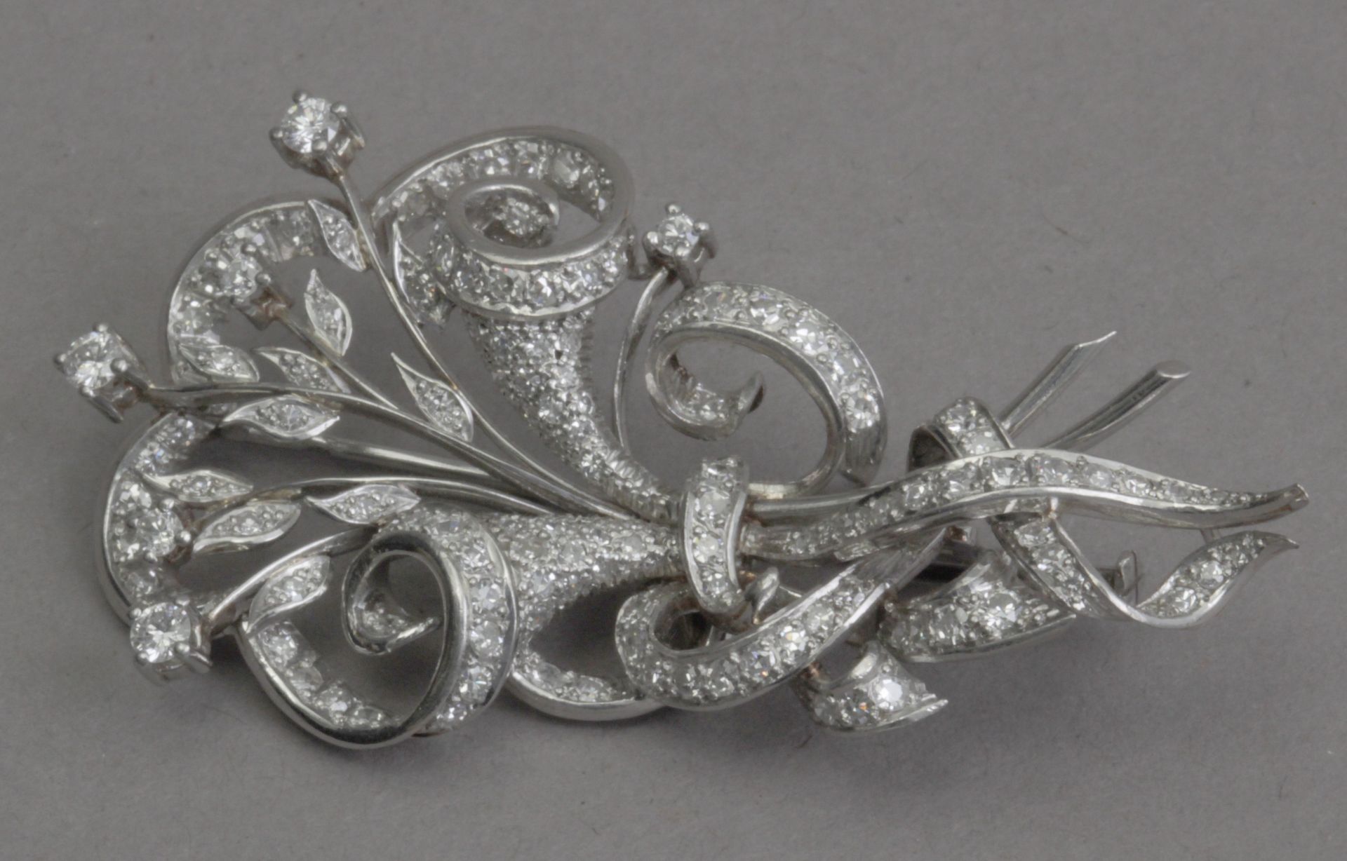 A second third of 20th century diamond brooch in a platinum setting