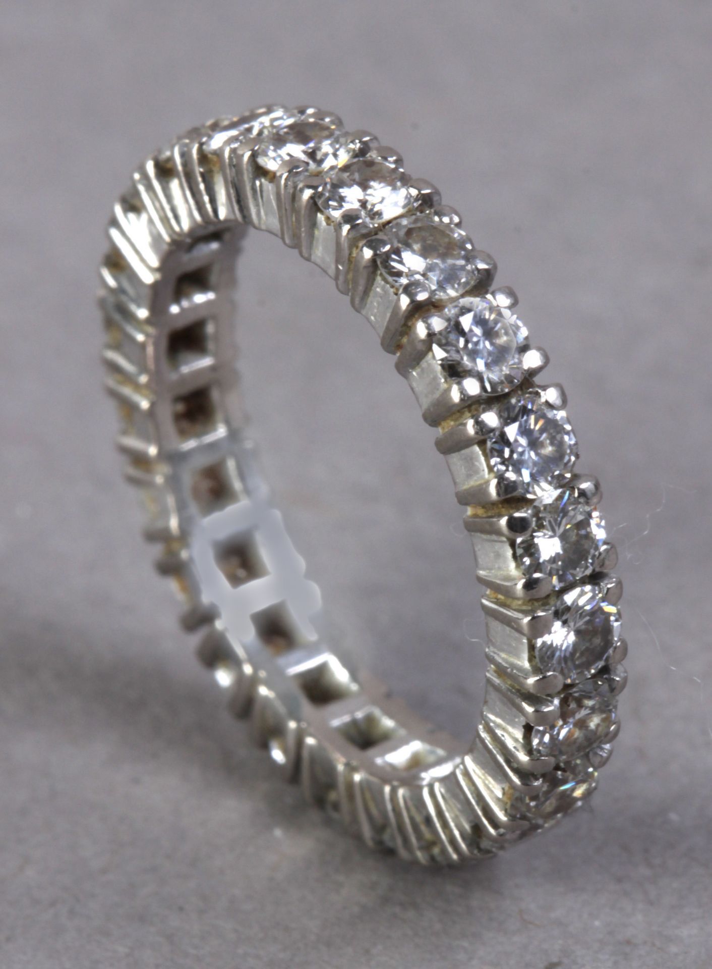 A diamond eternity ring with a platinum setting