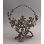 An Art Nouveau wrought iron jardiniere in the style of Manuel Ballarin in 1900